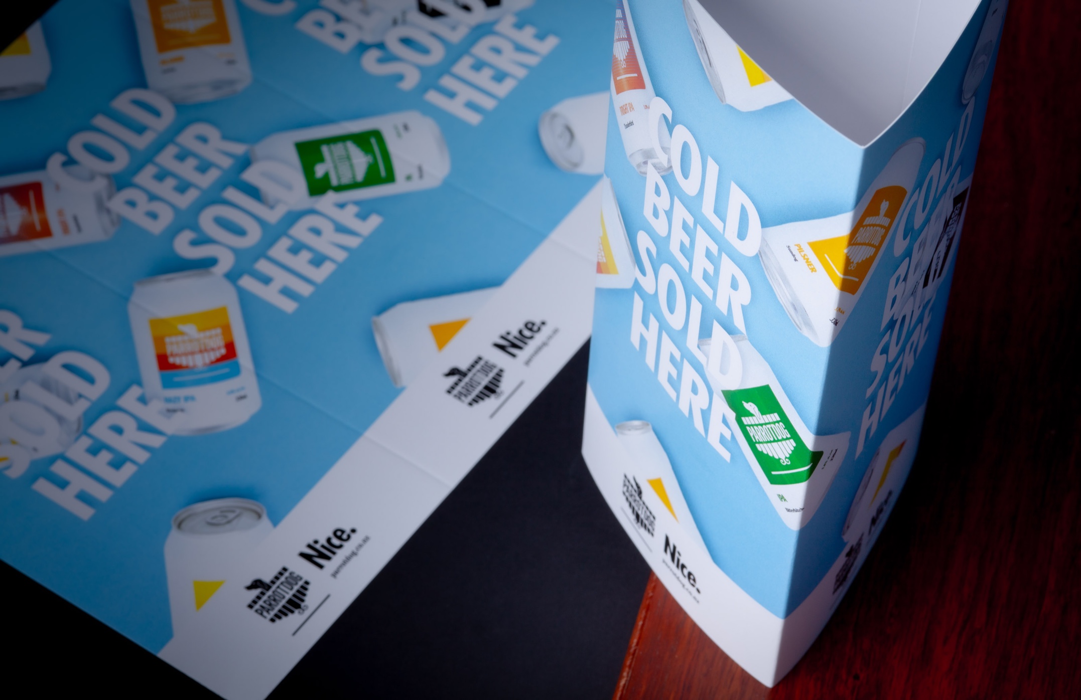 Branded table talkers for Parrotdog Brewery—digitally printed, diecut, and supplied flat for easy assembly; designed for bold in-venue display and seamless rep distribution.