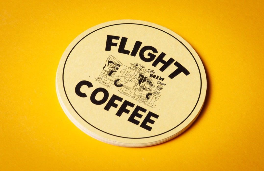 Custom 93mm circle diecut coasters, printed for Flight Coffee Hangar
